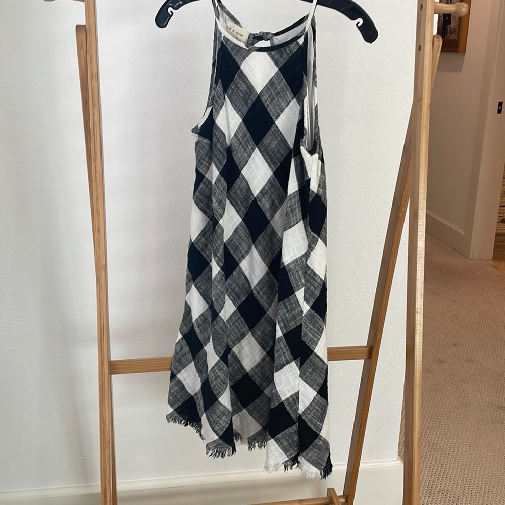 Anthropologie. Size S. Black and white checkered dress with fringe detail hem